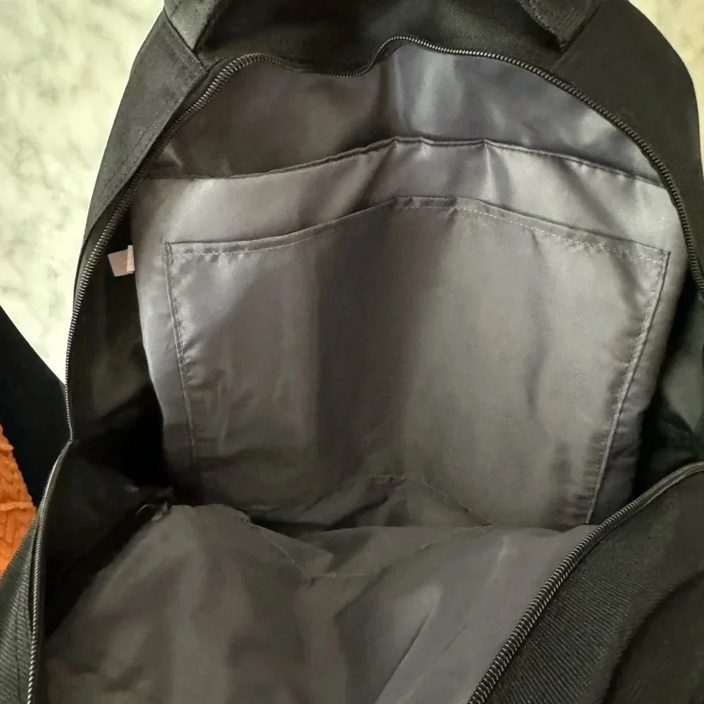 Black Backpack with 3 compartments for stuff NWOT 12x17x4